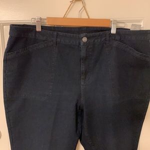 Women’s jeans size 20, are fitted from the waist and flare pass the knees.